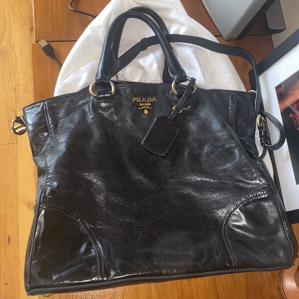 Beautiful black Prada handle, shoulder or crossbody bag! Comes with dust bag!